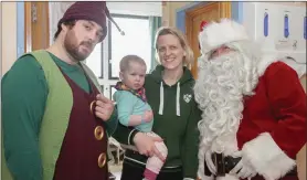  ??  ?? Susan and Shea Leonard with Rudey and Santa.