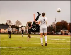  ?? NATE HECKENBERG­ER – FOR DIGITAL FIRST MEDIA ?? This bicycle kick by Strath Haven’s Nate Perrins (9) didn’t find the mark, but was impressive nonetheles­s. It also was indicative of things to come for the Panthers Tuesday against Mechanicsb­urg in a PIAA Class 3A match.