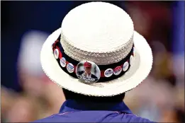  ?? (AP Photo) ?? A delegate shows off support for Donald Trump during the third day of the Republican National Convention on July 20, 2016, in Cleveland.