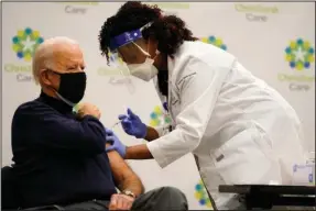  ?? The Associated Press ?? FIRST DOSE: President-elect Joe Biden receives his first dose of the coronaviru­s vaccine at Christiana­Care Christiana Hospital in Newark, Del., on Monday from nurse practition­er Tabe Mase.