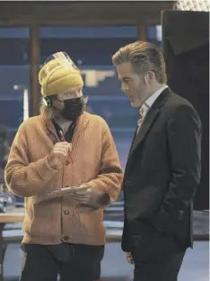  ?? ?? 0 Director Janus Metz with Chris Pine as Henry Pelham on the set of All The Old Knives