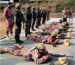  ?? — PTI ?? Oman’s Army personnel are trained in rifle shooting during the Indo-Oman joint Army exercise, AL NAGAH-II, at Bakloh, near Dalhousie in Chamba, on Friday.