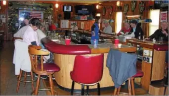  ?? KEVIN TUSTIN – DIGITAL FIRST MEDIA ?? The bar at American Legion Post 951 slowly fills up Sunday afternoon. No NFL games were aired in the post as a counteract­ion to protests during the National Anthem carried out by NFL players.