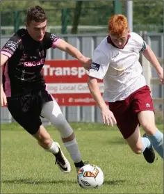  ??  ?? Wexford’s Dean George chases after Mike Whelan of Galway.