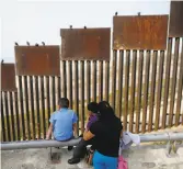  ?? Gregory Bull / Associated Press 2016 ?? Metal bars mark the Mexico-U.S. border in Tijuana. As a candidate, Donald Trump promised a border wall.