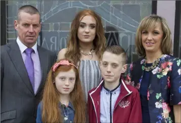  ??  ?? Kilrane NS pupil David O’Rourke who made his Confirmati­on in St Patrick’s Church, Rosslare Harbour on Friday morning, with his parents Eamonn and Clare, and sisters Emma and Eimear.