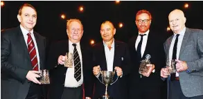  ??  ?? Honoured: Des Seabrook, far right, collects his award during the Rugby Union Writers’ annual dinner along with, from left, Chris Myers, Bryan James, Eddie Jones and Ben Ryan