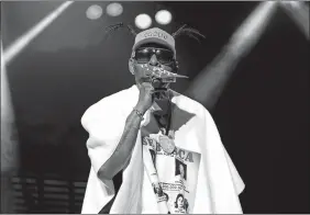  ?? ROB GRABOWSKI/AP FILE ?? Coolio performs during the “I Love The 90’s” tour on Aug. 7 at RiverEdge Park in Aurora, Ill.