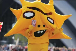  ??  ?? Partick Thistle mascot Kingsley with his Wee Red Book