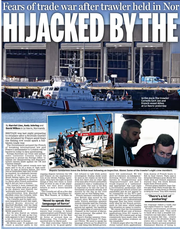  ?? ?? In the dock: The trawler Cornelis Gert Jan and French vessel Athos at Le Havre yesterday
Dispute: Gendarmes leave the British boat following an inspection. Above: Some of the trawler’s eight crew members