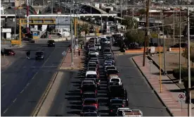  ?? Photograph: Hérika Martínez/AFP/Getty Images ?? Vehicles queue to cross into the city of El Paso on the Mexico side of the Bridge of Americas on 3 November 2020.