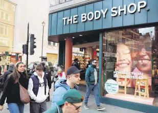  ?? ?? Pedestrian­s walk by a branch of The Body Shop in central London, U.K., Feb. 12, 2024.