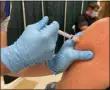  ?? PHOTO PROVIDED BY MADISON COUNTY ?? Vaccine going into a person’s arm.