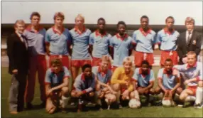  ??  ?? Net buster par excellence... Phillip (2nd from right - squatting) with the first-ever mixed race Under/20 youth football team in then Apartheid South West Africa. Standing from left: Klaus Linow (team manager), Lothar Kolmitz, Jorge Schmidt, Gero Diekmann, Muuaa Siririka, Forra Nicodemus, Packs Uushona, Frank Fredericks, Bobby Ihlein (coach). Front row from left: Jose Viljoen, Simon Kgobetzi, Ulf Gruttemeye­r, Tony Bergemann, Salathiel Kavendjii, Phillip Muinjo, Manfredt Egerer.