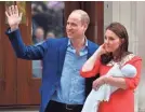  ?? AFP/GETTY IMAGES ?? A royal welcome for William, Kate and baby Louis.