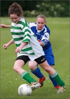  ??  ?? Ciara Larkin of St. Cormac’s is policed by Mary Martin (Tombrack).