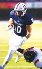  ?? STAFF PHOTO BY ROBIN RUDD ?? Gordon Lee’s Cade Peterson (10) breaks a tackle to score against Lafayette on Sept. 18. Peterson rushed for 279 yards and three touchdowns against Mt. Zion-Carroll last Friday night.