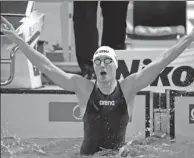  ?? GREGORY SHAMUS / GETTY IMAGES / AFP ?? Katinka Hosszu of Hungary celebrates her victory in Sunday’s 100m butterfly final at the FINA short course world championsh­ips in Windsor, Canada.