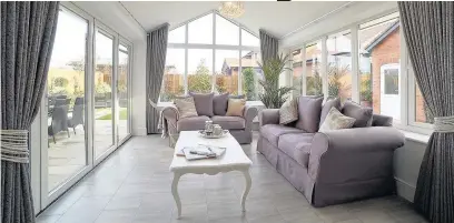  ??  ?? ●● A garden room in one of the new detached houses at Bollin Park