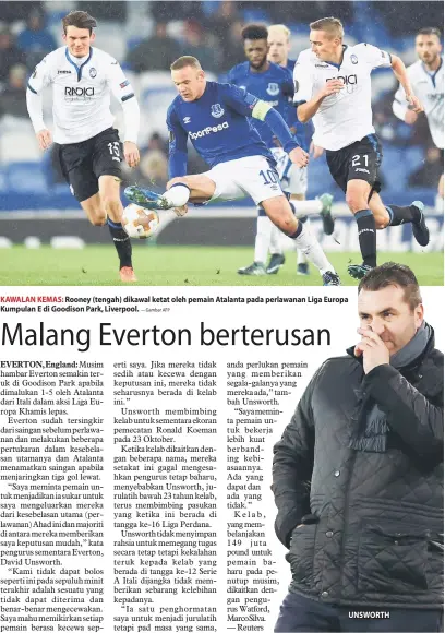  ?? — Gambar AFP ?? KAWALAN KEMAS: Rooney (tengah) dikawal ketat oleh pemain Atalanta pada perlawanan Liga Europa Kumpulan E di Goodison Park, Liverpool. UNSWORTH