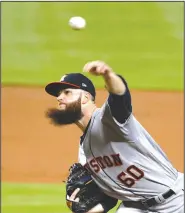  ?? AP/WILFREDO LEE ?? Houston left-hander Dallas Keuchel (Arkansas Razorbacks) is back on the disabled list with a pinched nerve in his neck. Keuchel missed his start Wednesday with what the Astros originally called sickness. They said Thursday that his neck problem had...