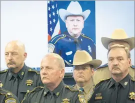  ?? Marie D. De Jesus
Houston Chronicle ?? HARRIS County Sheriff ’s Deputy Darren Goforth, in portrait, was in uniform as he pumped gas outside Houston. His killer approached him from behind.