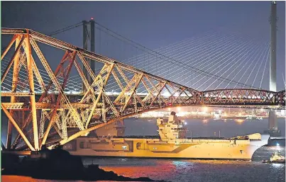  ?? Picture: Getty. ?? The new aircraft carrier departs the Forth to embark on sea trials.