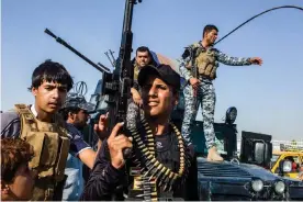  ??  ?? Iraqi men marching to a recruiting centre in west Baghdad, June 2014. In the weeks following the fall of Mosul in 2014, tens of thousands of Iraqi Shia men flocked to recruiting centres to join the militias fighting Isis. Photograph: Ghaith Abdul-Ahad/The Guardian