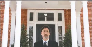  ?? THE CANADIAN PRESS/SEAN KILPATRICK ?? Prime Minister Justin Trudeau addresses Canadians on the COVID-19 pandemic from Rideau Cottage in Ottawa on Tuesday.