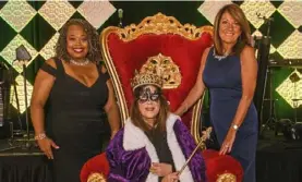  ?? Steve Mellon/Post-Gazette ?? Toni Murphy, left, Audrey Russo and Deb Rice-Johnson at the Epilepsy Associatio­n’s Mardi Gras benefit on Wednesday.