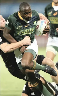  ?? | AP PHOTO ?? BLITZBOKS captain Siviwe Soyizwapi on the charge in the Dubai final.