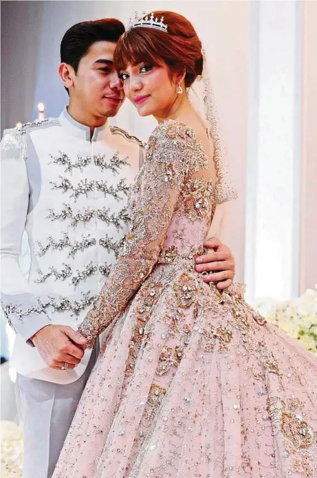  ??  ?? Amar and Amyra at their fairy tale wedding reception last November. — Manggis Production Sdn Bhd