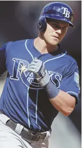  ?? AP PHOTO ?? DEEP IMPACT: Jake Bauers rounds the bases after hitting a two-run home run in the Tampa Bay Rays’ 19-6 rout of the Twins yesterday in Minneapoli­s.