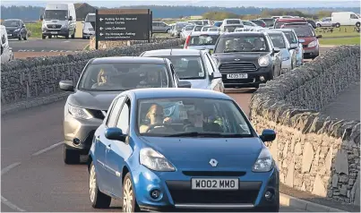  ?? Picture: Kris Miller. ?? A busy West Sands, St Andrews.