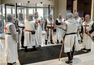  ??  ?? At the investitur­e ceremony these members of the order will represent the nine knights who, some sources say, made upthe original Knights Templar.