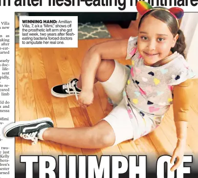  ??  ?? WINNING HAND: Amillian Villa, 7, a k a “Mimi,” shows off the prosthetic left arm she got last week, two years after flesheatin­g bacteria forced doctors to amputate her real one.