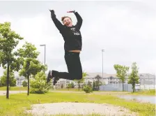  ??  ?? Jill Konkin takes a last leap at the Centennial long jump mound. She finishes her career without being able to coach one final track and field season.