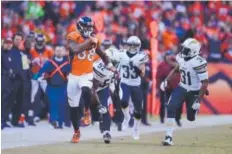  ??  ?? Demaryius Thomas breaks away fromthe Chargers’ defense on a 72- yard touchdown play that came on the second snap of the Broncos’ regular- season finale last weekend. Eric Lutzens, The Denver Post