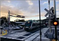  ?? ?? A northbound SMART train rolls past the San Rafael Transit Center. SMART officials are considerin­g seeking a sales tax renewal.