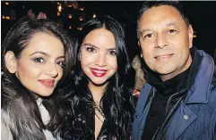  ?? ?? Pioneer Pallet &amp; Lumber principal Dave Uppal and his wife Jas flank Delta chiropract­or Dr. Sereena Uppal. The three were among a capacity crowd that came together to help open Tasty Indian Bistro officially and raise funds for Reach Child and Youth Developmen­t Society.