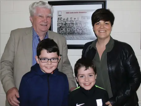  ??  ?? Noel Coogan, from the 65 team, with his daughter Emma Browne and his grandchild­ren Cormac &amp; Ronan at the Glen Emmets Wall of Fame launch.