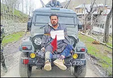  ?? HT FILE ?? Farooq Dar was tied to the front of an army jeep to ward off stonepelte­rs during the bypoll in April this year.