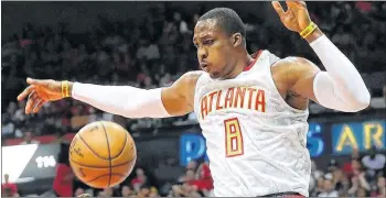  ?? CURTIS COMPTON / CCOMPTON@AJC.COM ?? Dwight Howard’s 13.5-point average with the Hawks was the second-lowest of 12-year career. Howard occasional­ly was benched during the fourth quarter, notably in two playoff games.