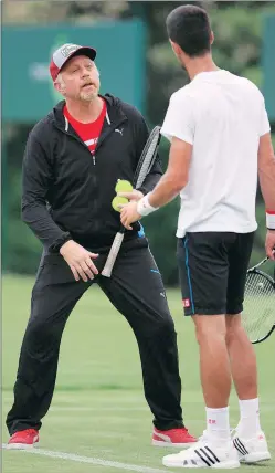  ?? AP ?? Boris Becker and Novak Djokovic during a practice session at Stoke Park, Buckingham­shire, days before the start of Wimbledon.