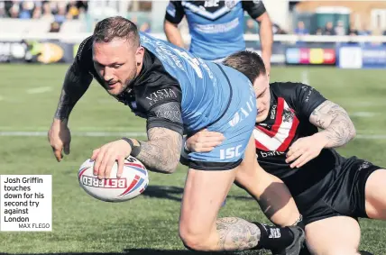  ??  ?? Josh Griffin touches down for his second try against London