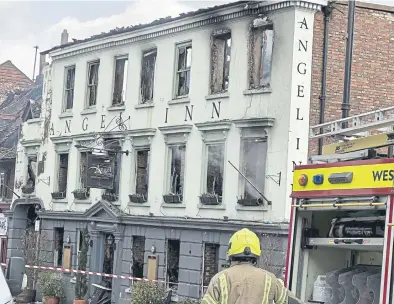  ?? ?? The Angel Hotel following the fire | Picture: Joe Swales