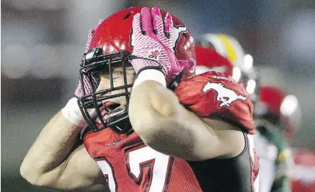  ?? LEAH HENNEL/CALGARY HERALD. ?? Calgary’s Jeff Hecht reacts to an Edmonton intercepti­on during the Eskimos 15-11 win at McMahon Stadium in Calgary on Saturday.