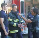  ??  ?? Buck (Oliver Stark, left), Bobby (Peter Krause) and Athena (Angela Bassett) are first responders on the unforgivin­g streets of L.A. in “9-1-1.” RICHARD FOREMAN JR./FOX