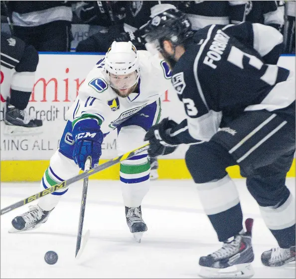  ?? — THE ASSOCIATED PRESS FILES ?? There are many reasons why the Canucks would want to relocate the Utica Comets to the West Coast and have promising players, like former prospect Nicklas Jensen, left, closer at hand, but don’t expect the AHL team to move right now, writes Steve Ewen.