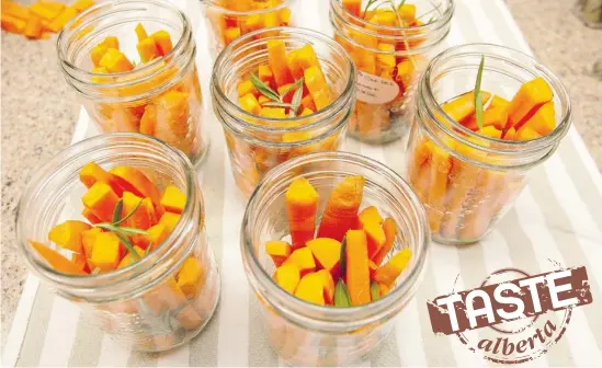  ?? Photos: Greg Southam/edmonton Journal ?? The fresh flavour of carrots is preserved through canning. Preserved vegetables and gourds bring back the taste of summer while the snow is on the ground.